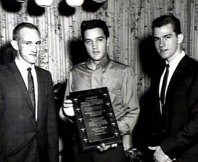 Jacob_Still's tweet photo. Went and watched the new @ElvisMovie, reminded me that Elvis was a honorary TKE at @ArkansasState. Here the King is pictured with Bob Howe a professor of radio and Rick Husky the president of TKE at ASU. Elvis was an #ASUIndian!!! https://t.co/dxgF89pkQZ