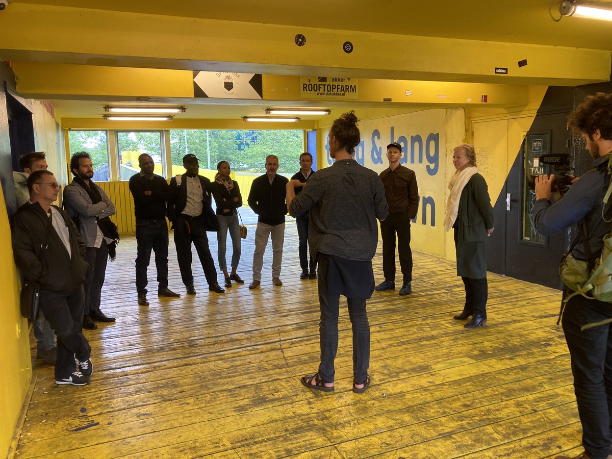 d_akkers's tweet photo. This morning an international #rooftopexcursion with the people of the @GCAdaptation, #ResilientRotterdam, the #Shelteracademy, @UNHABITAT and @ArcadisGlobal. #Rooftopfarmer Wouter Bauman told them what green- & #smartroofs can contribute to #climateadaptation in the cities 🌏☔. https://t.co/5cCTtQiUsy