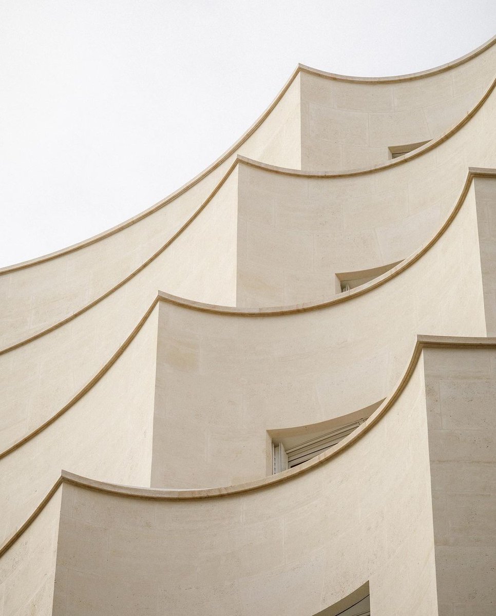 Dang. In Paris, they tore down a police station and built this. 

Yep, social housing: 8 low-income units on a tiny piece of land. 6th arrondissement, blocks from Jardin du Luxembourg. 

Stone facade (quarried locally to boot), green roof, energy efficient