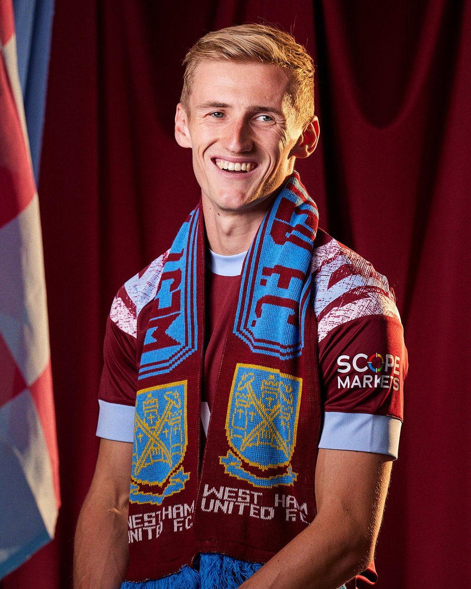 Wearing his grandad's scarf as he signs for his boyhood Club. The stuff of dreams.