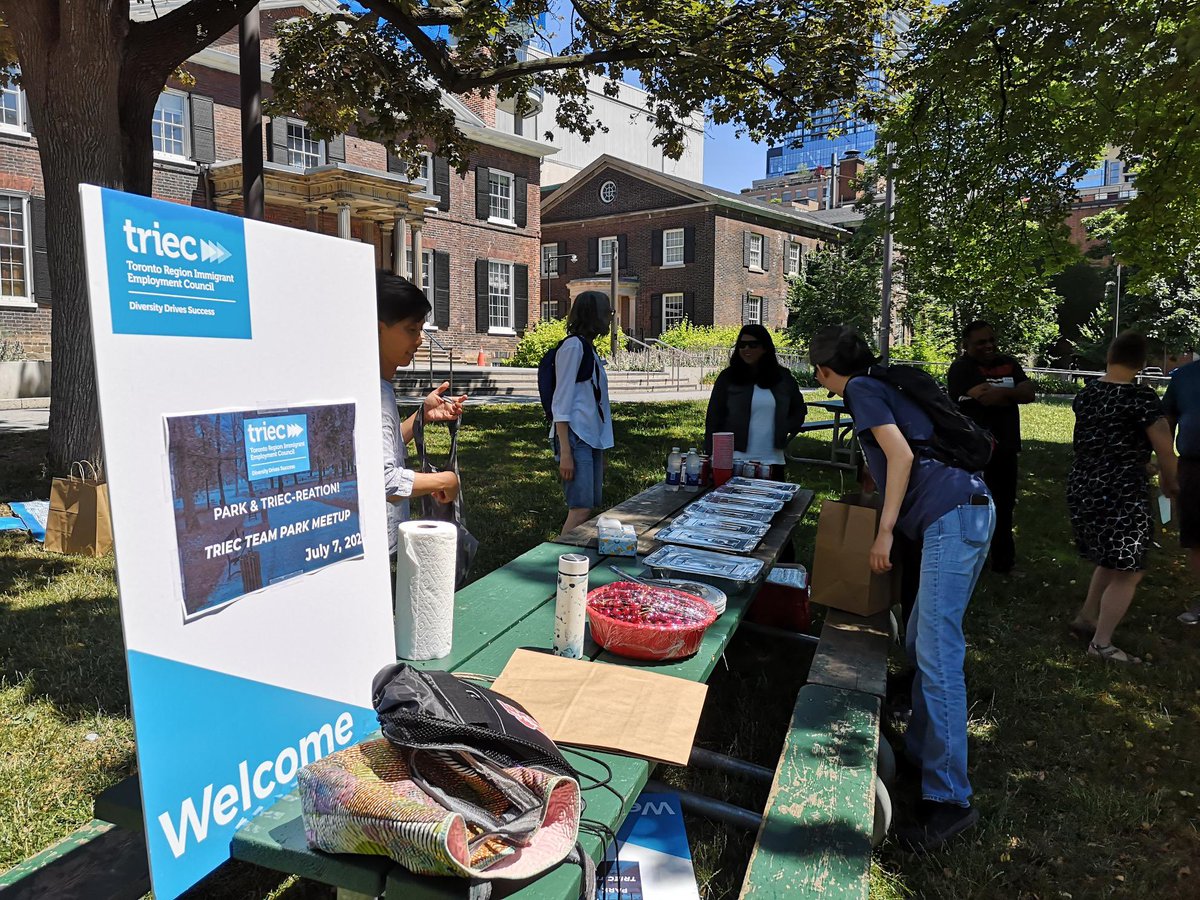 TRIEC's tweet photo. The TRIEC team got together for a social and lunch in the park. We had fun meeting new team members and reconnecting with colleagues we had only seen on Zoom. #team #TRIEC #socializing #food https://t.co/aMYpbnCVLA