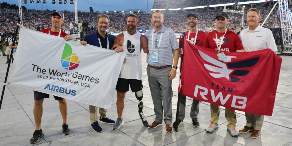 TeamRWB's tweet image. The #OldGloryRelay concluded tonight in Birmingham, AL as the American flag, carried by @Noah_Galloway arrived at the opening ceremonies of @TWG2022, presented by @Airbus!
