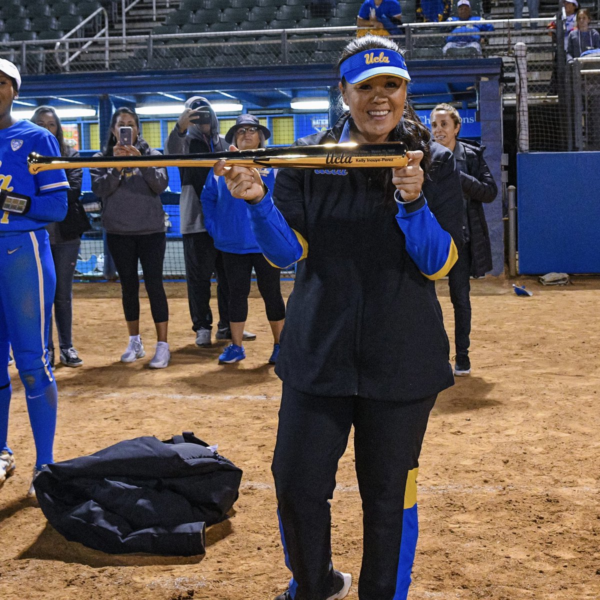 #ThrowbackThursday to our Super Regional win over Duke that advanced us to our seventh consecutive #WCWS, the longest streak in the nation. Our @UCLAAthletics Hall of Fame Coach Kelly Inouye-Perez received a ✨ golden bat ✨ in honor of her 700th career win. #GoBruins