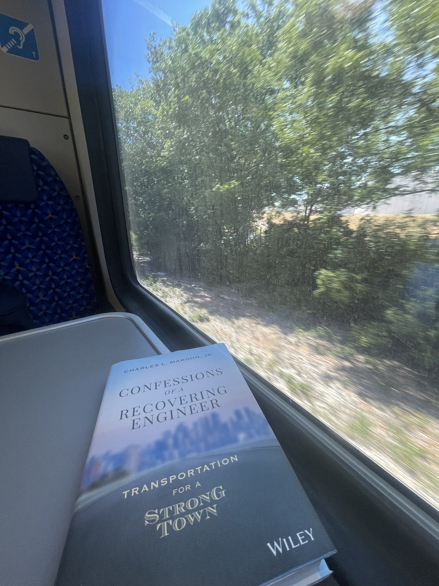 n350sl's tweet photo. Urbanist trifecta - Riding the rails with Fort Worth TexRail, reading @StrongTowns, and listening to @alanthefisher’s train-inspired music mixes. 

And @notjustbikes’s #orangepill was the introduction to it all. https://t.co/tgPwmYv7AT
