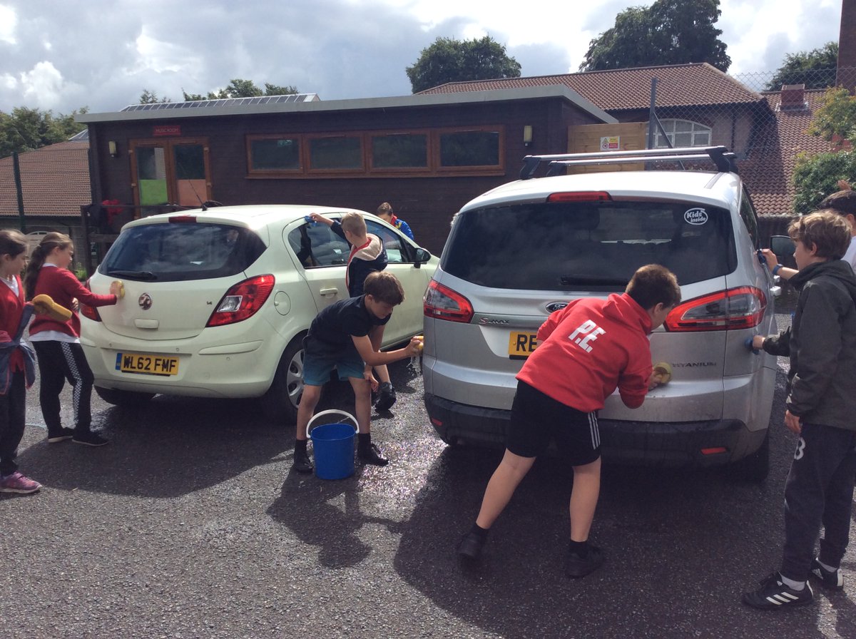 Year 5s at Okehampton Primary decided to hold a staff car wash after learning about charity in PSHE. They used our trust value of democracy to vote for the charity - Tor Support. We are so proud of how they all behaved and staff are very happy with their shiny cars!