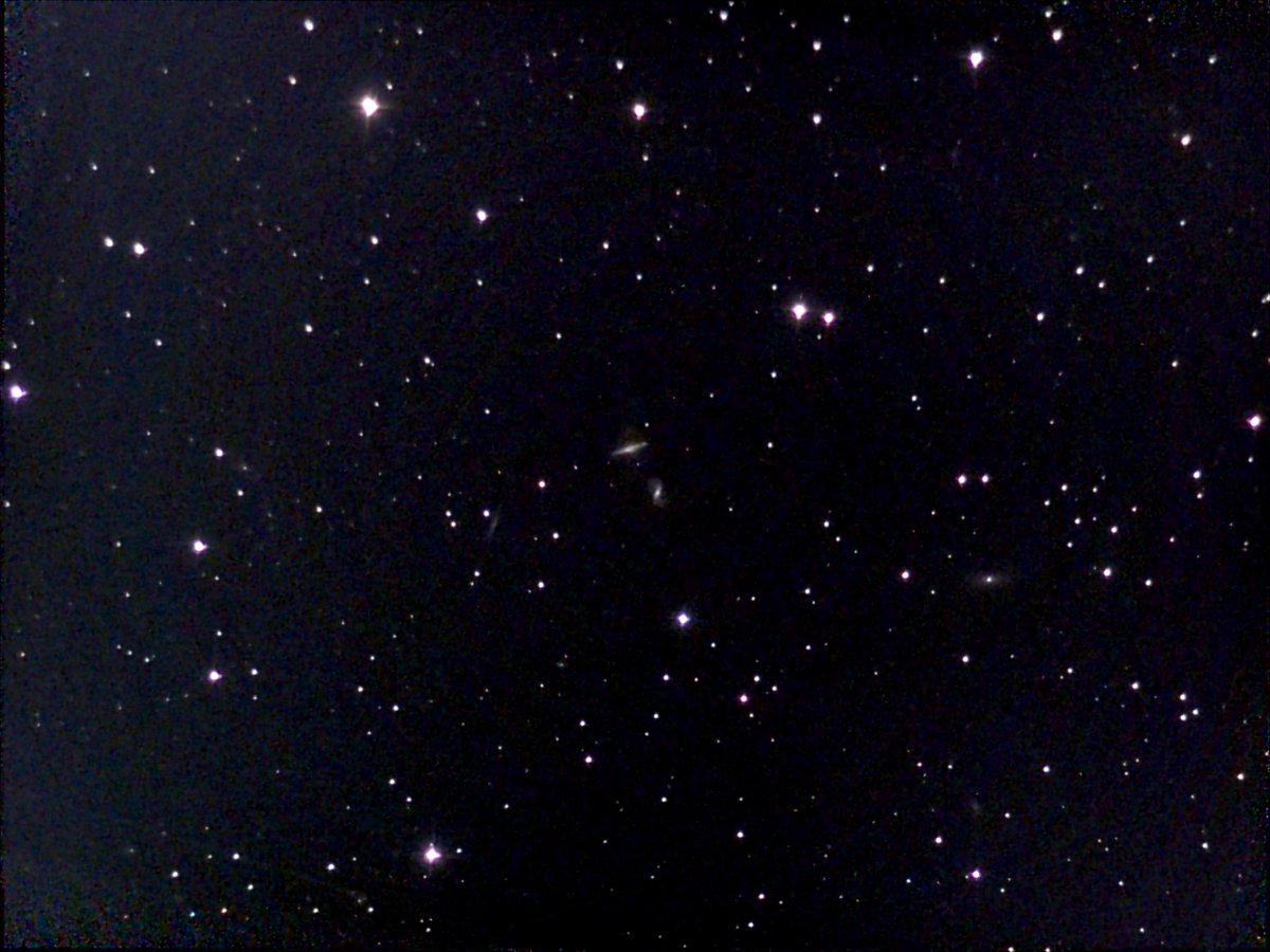 AstroMikeMerri's tweet photo. Some gaps in the high clouds last night, so a quick non-#LockDownAstronomy look with the @Unistellar #eVscope at an object from my favourite car-crash collection, The Arp Catalog. This object, Arp 293, comprises a pair of galaxies, NGC 6385 & 6286. https://t.co/EFFGep2BZb