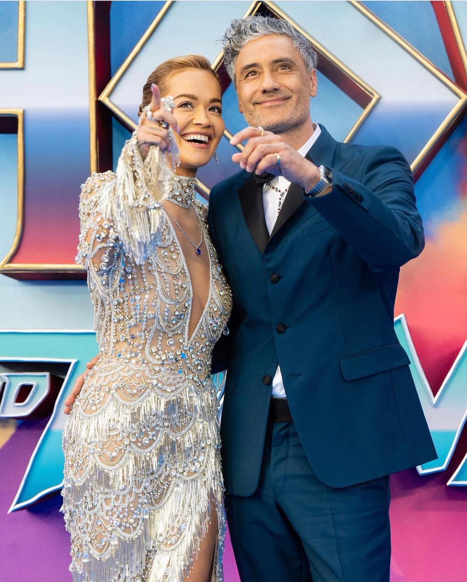 TaikaWaititi's tweet photo. Fabulous London premiere with beloved family &amp; close friends. Can't wait for you all to see it. July 8 baby!#thorloveandthunder @marvelstudios 
Stylz: @jeanneyangstyle 
Body covering: @prada 
💎: @cartier https://t.co/3dI3slZ7Td