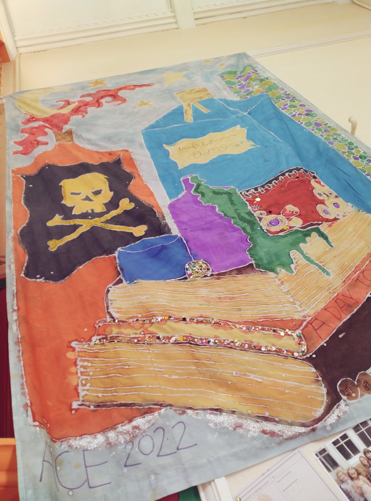 Our wonderful caretaker helped hang our whole school batik from the rafters last night! Every child in our school added something to it and every time they walk past they will remember our #DaytoCreate <a href="/Artsmarkaward/">Artsmark</a> <a href="/GrimmAndCo/">Grimm & Co</a>