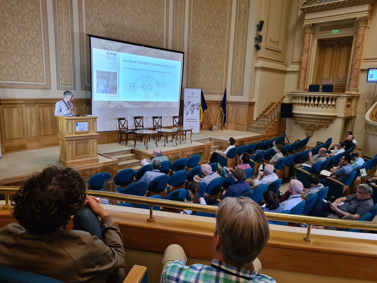 LeRadu's tweet photo. The lovely University Aula hosting #ichc2022 Bram Vannieuwenhuyze arguing for the importance of map transmission alongside production reception @2021Ichc #cartography #maphistory https://t.co/WN5rZfNOz0