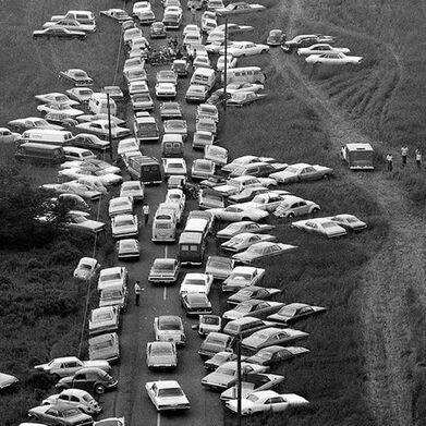 50YearsAgoLive's tweet photo. Chaos erupts at the Mount Pocono Music Festival in Long Pond, Pennsylvania as excessive rain combined with overcrowding and water shortages causes thousands to become stranded and forced to walk miles to get out. https://t.co/lHXrFzKUaM