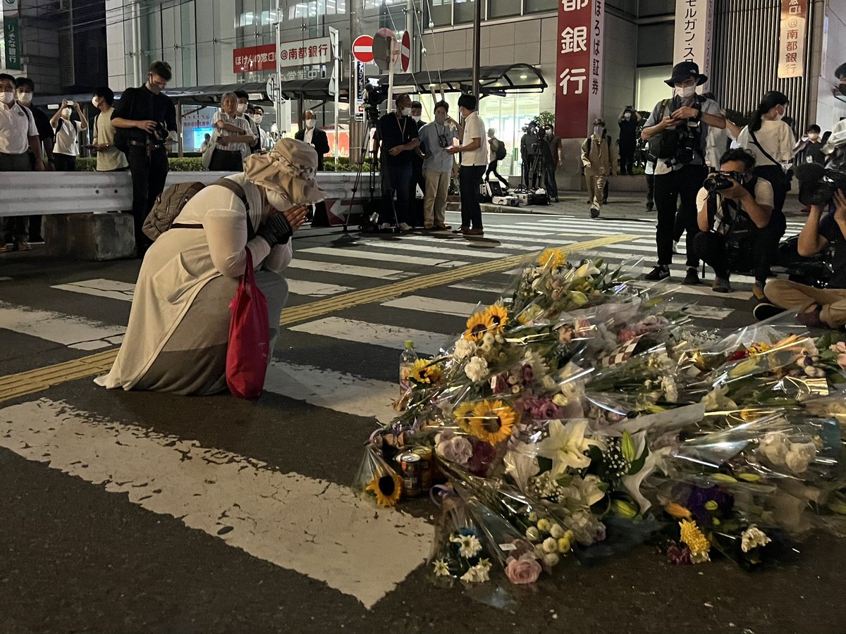 Many people are offering flowers for former PM Shinzo Abe who was shot at this spot earlier today. Very tragic.