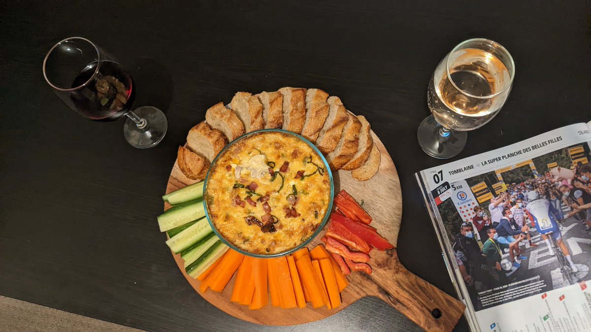 #couchpeloton #fromageFriday feast from @Unbelievabubbl5 and myself is a baked cheese dip, with bread, cucumber, carrot and capsicum. #toursnacks