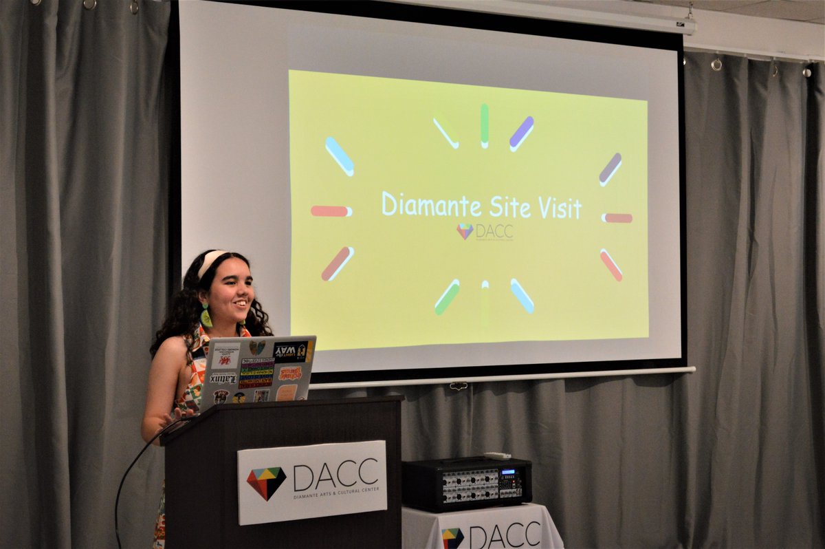UnitedArtsWake's tweet photo. Our Diversity in Arts Leadership (DIAL) internships are in full swing! Alhanna (at podium) is working on a NC Latino Artist Database for @diamanteACC. Sabrina (white dress) & the interns read poems from her Poetry in Motion project for Wake schools @burningcoaltc #DIAL22 https://t.co/6lnjk6jJ1z