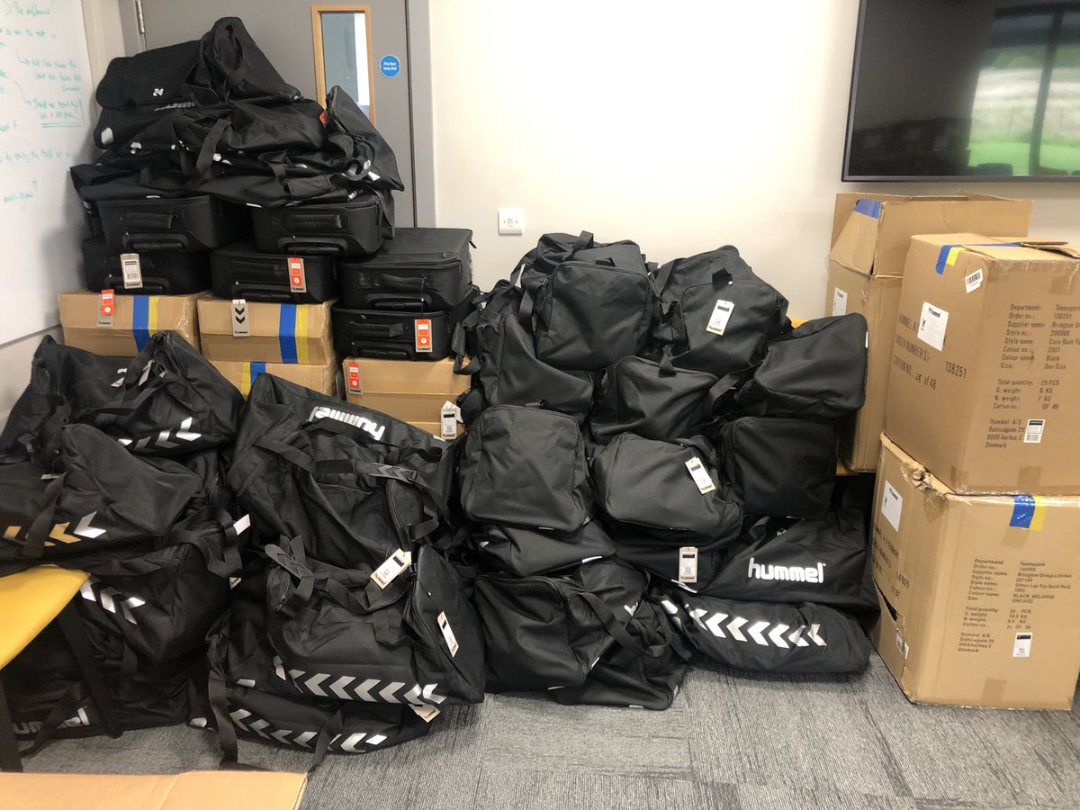 WaspsKitMan's tweet photo. Kitman Clearout, me and Daniel are at work for a very long day tomorrow sorting what new kit we have ready for everyone’s return on Monday. Thinking of putting together another mystery box from last season, anyone interested ? #everykitmanknows. 🍷 https://t.co/YqmYzU26i1