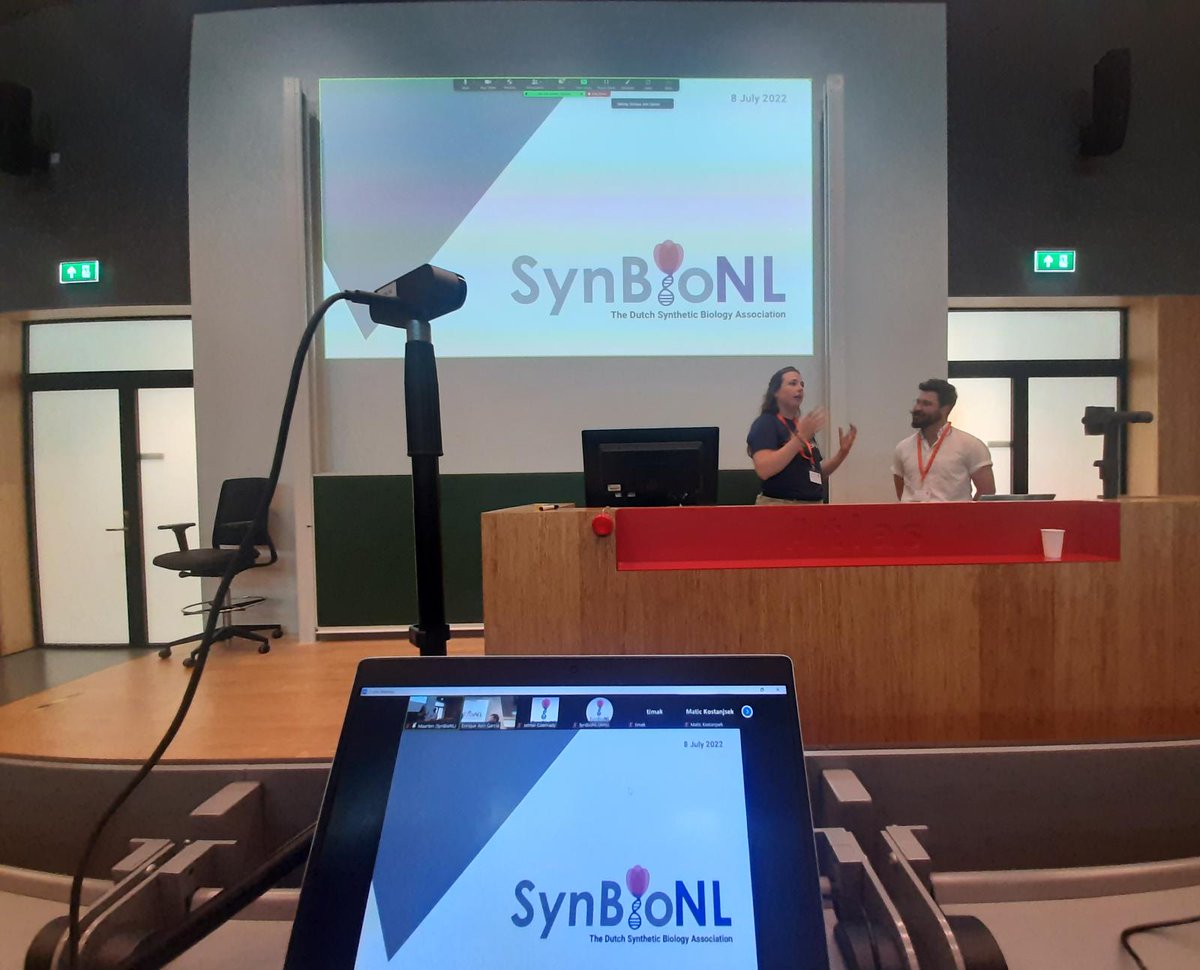 SynBio_NL's tweet photo. Some glimpses of our successful #SynBioNL event launch!! With our own @MECrooijmans and @EAsinTHETIC introducing us, and talks about SynBio-&amp;-Society by Kyra Delsing from the @RathenauNL, and the past and future of @igem by @bluepumpkin0801 and Nemanja Stijepovic!! 🦠🎉🎉 https://t.co/KTk8kBSiPg