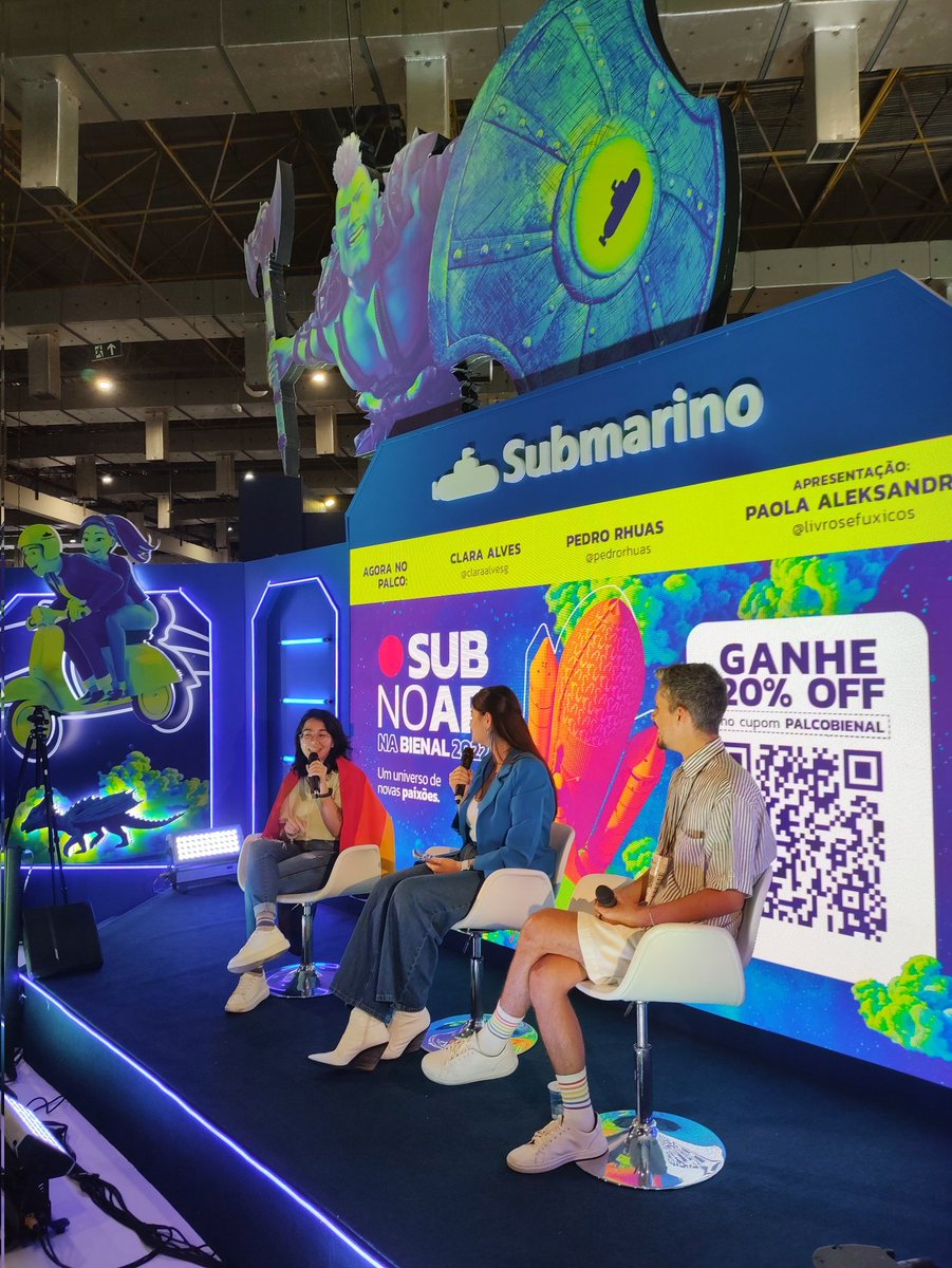 submarino's tweet photo. Mais um palco do #SubNaBienal começando com a Paola Aleksandra conversando sobre literatura jovem com a @altaexposicao e o @pedrorhuas. Quer acompanhar? Vem de #SubNoAr >> https://t.co/W88ntRHQD2 https://t.co/TMI5i2t3ZJ