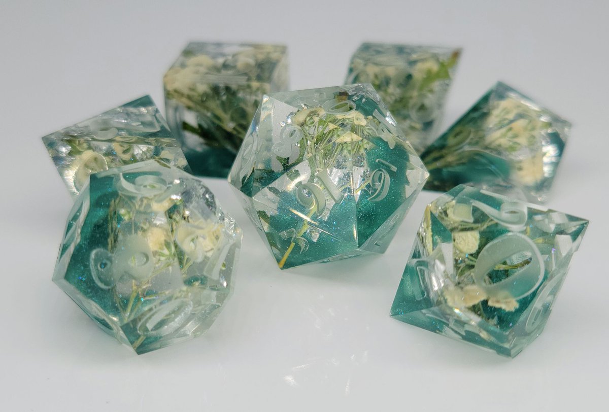 Nat1Fun's tweet photo. On tomorrow's Winter's End episode, Noon CST on https://t.co/hsVsTaTiAT, we will be giving away this immaculate set of dice by our very own @APLSKTL who runs her own shop @ForbiddenFae

Bee there or bee...somewhere else I guess, but why not get you a free set of dice, ya know?! https://t.co/8NftA1hY3H