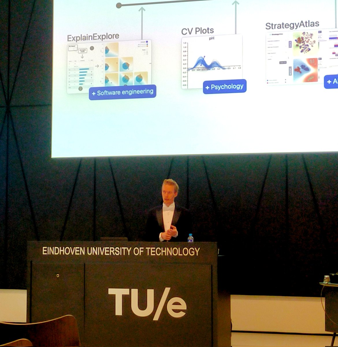 StefvandenElzen's tweet photo. Dennis Collaris @imDecode rocking the stage at his PhD defense @TUeindhoven on Interactive #Visualization for interpretable #ML. With success! Congratulations young Dr. #xai More info: https://t.co/Zzx84z9QH2 https://t.co/lPEc89uDmM