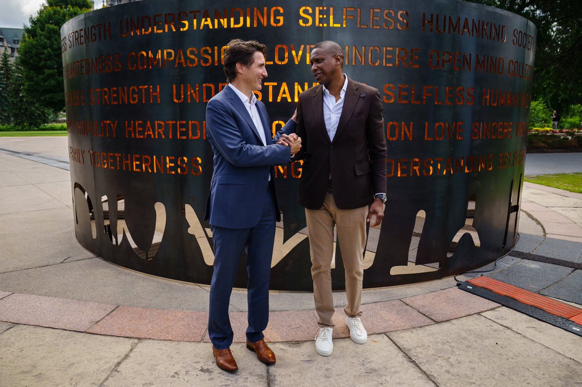 JustinTrudeau's tweet photo. The message of the Humanity Art Installation is one of hope – hope that we can all live together and build a country where people are free to be who they are. At today’s unveiling with Masai Ujiri, I reaffirmed that that’s the future we’re building with Canadians. #ThatsHumanity https://t.co/Lsr2hIQymI