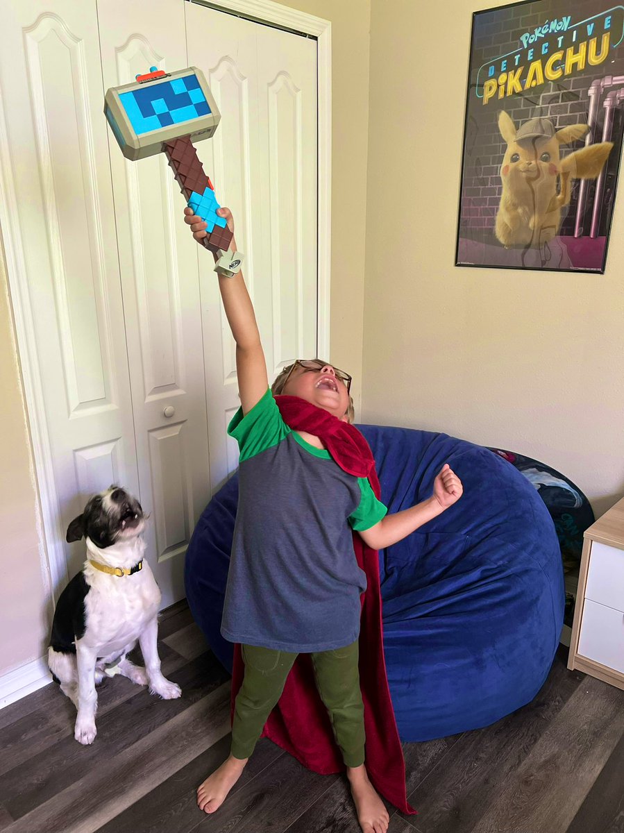 Schmalamo's tweet photo. What happens when the kids are home with dad. Landon “God of Thunder” and his faithful companion Dominio the Great! #homewithdad #thor #marvel #hemsworthwho #godofthunder https://t.co/kvL9mYzZ4l