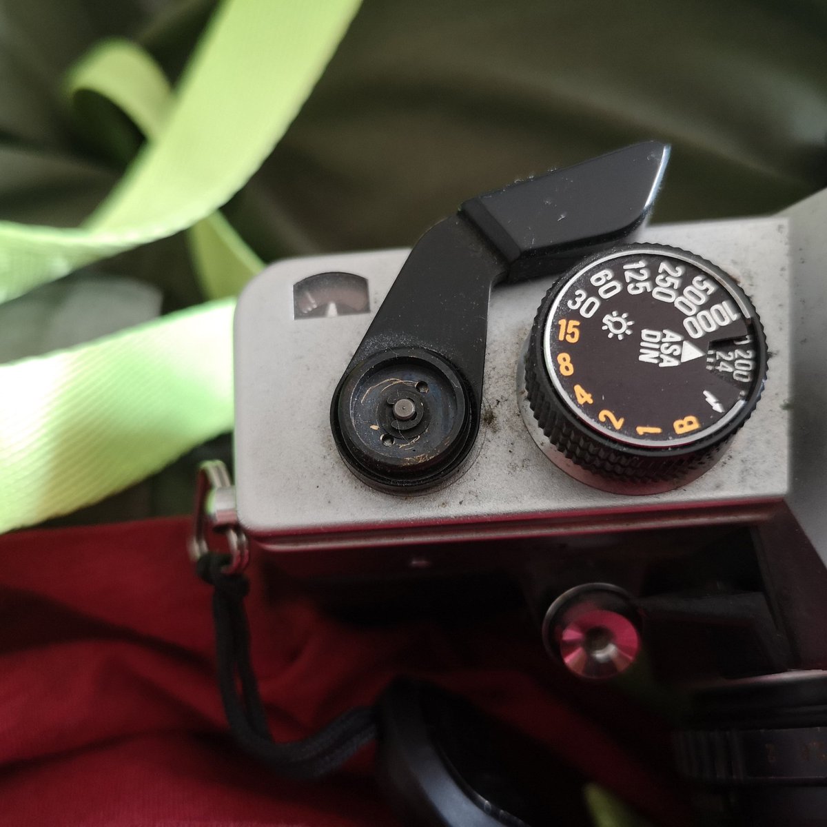 The bit that goes on top of the winding lever seems to have fallen off at some point without me knowing. Anyone know where I can pick one up or is it just cosmetic part?

Camera in question is the Praktica MTL 50