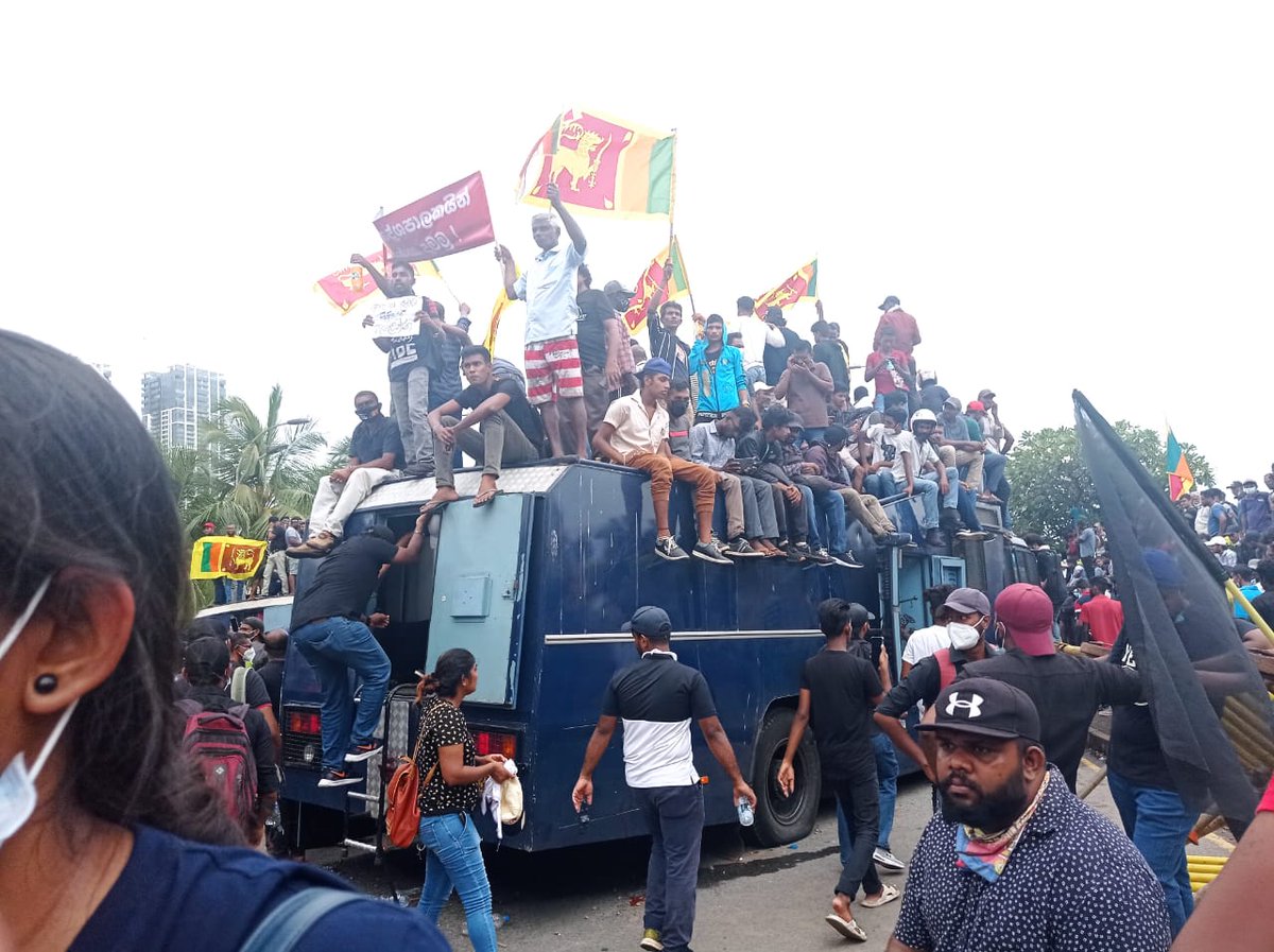 economynext's tweet photo. #SriLanka's #aragalaya protestors on top of water cannon trucks in #GalleFace at #GotaGoGama. #ProtestLK #aragalaya #EconomicCrisisLK #CountryToColombo #GotaGoGama #OccupyGalleFace #GoHomeGota #PowerToThePeople https://t.co/XDFojXnbwt
