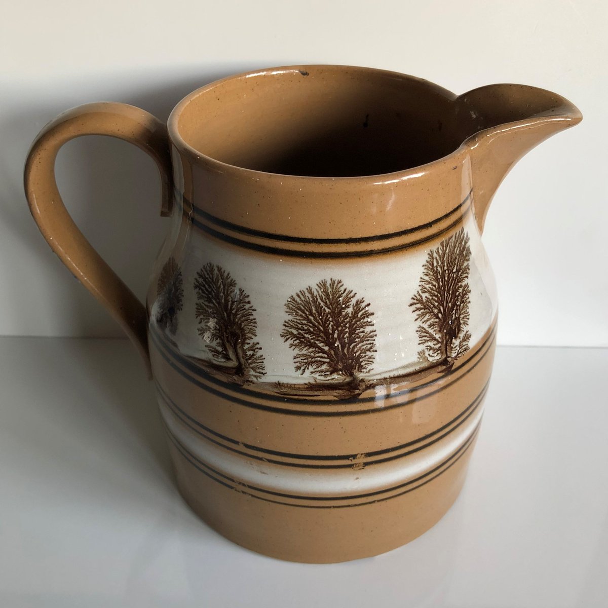 gresleypottery's tweet photo. A long drive down to Rowley's Fine Art in Ely, Cambridgeshire this week to bring home to Church Gresley this c1885 Mochaware 'Ship Shape' jug. Unusual in that it was decorated in blue on one side, and brown on the other ! #mochaware #cornishware #tggreen #ely #gresley #rowleys https://t.co/b973LCYgQ6