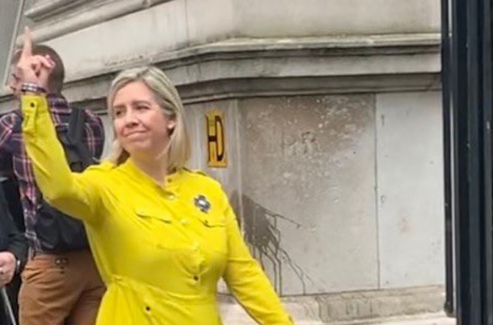 Isn’t this just the perfect visual metaphor for Boris Johnson’s premiership? This is England’s education minister Andrea Jenkyns greeting the public outside Downing Street. Classy.