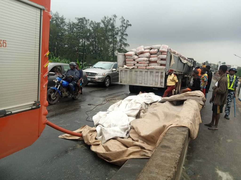 trafficbutter's tweet photo. VIA @followlastma: [9:30AM] #Isolo #DalekoBridge #AccidentReportReport of a double impediment at LASPOTECH involving a Dangote truck loaded with cement which caught fire on Daleko bridge inward LASPOTECH but has been extinguished by fire fighter https://t.co/5uJgW8kjy4