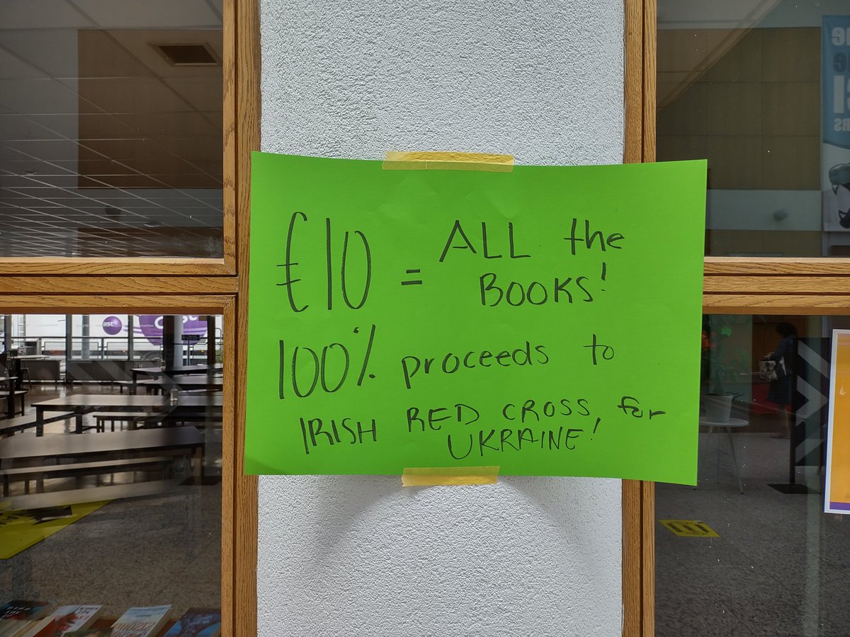 thelizmaguire's tweet photo. Absolutely ah-mazing YA and kiddie books down here for the Mayor Square Book Fair for Ukraine @NCIRL! https://t.co/127zMKeD5T