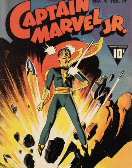 #エルヴィス の憧れのヒーロー、キャプテン・マーベルJr.は『JLA/JSA:欲望と希望の狂宴』にもちょびっと登場します。エルヴィスが髪型やステージ衣装の参考にしたという伝説がありますが、本書に出てくるキャプテン・マーベルJr.はむしろエルヴィスの方に髪型を寄せてますね https://t.co/rdLInHTbb3 