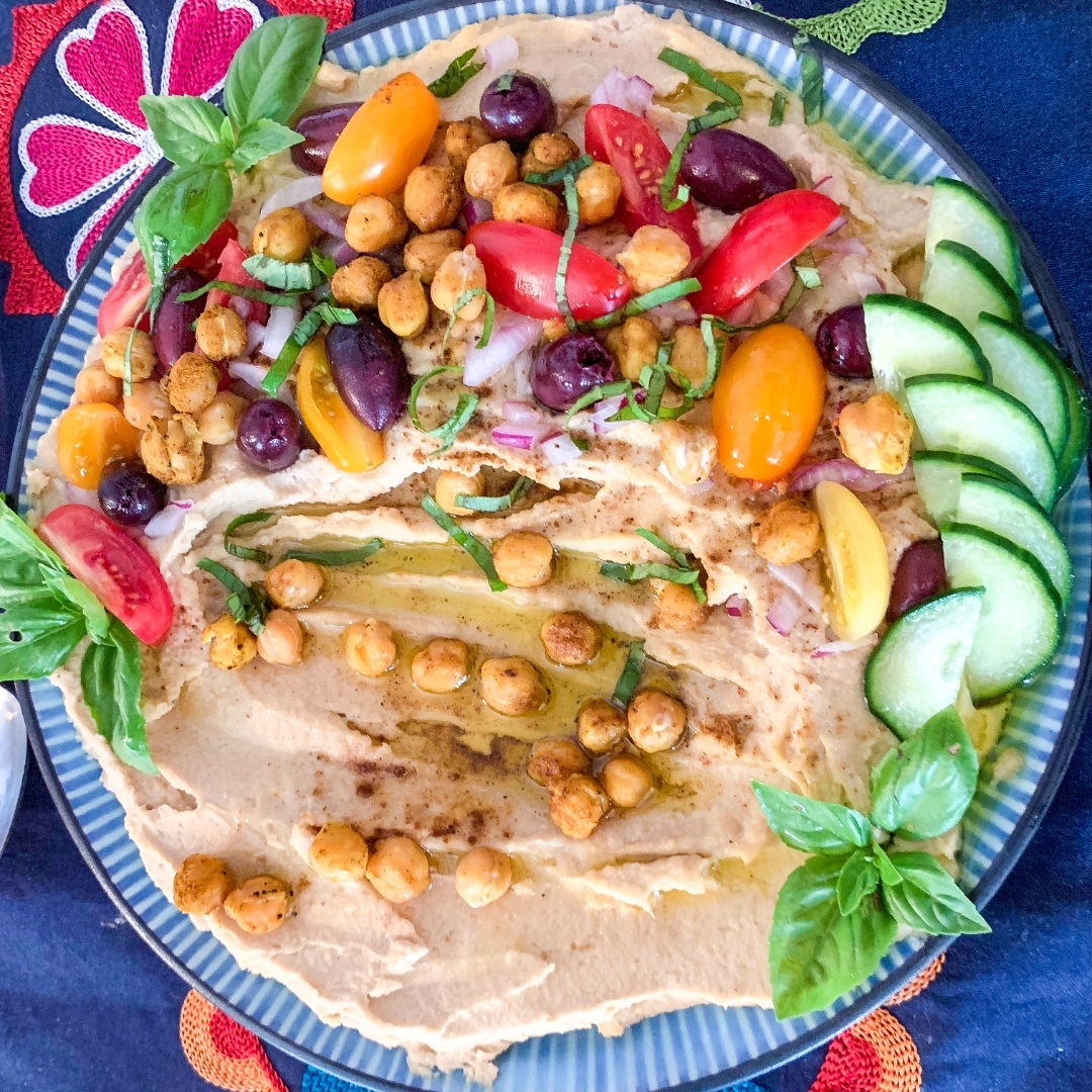 A dressed-up <a href="/KronosFoods/">Kronos Foods Corp.</a> Hummus plate, topped with local veggies makes it the coolest summertime snack by the pool or on the porch ☀️⁠

Courtesy of Ginsberg's Corporate Chef Dana Johnson
