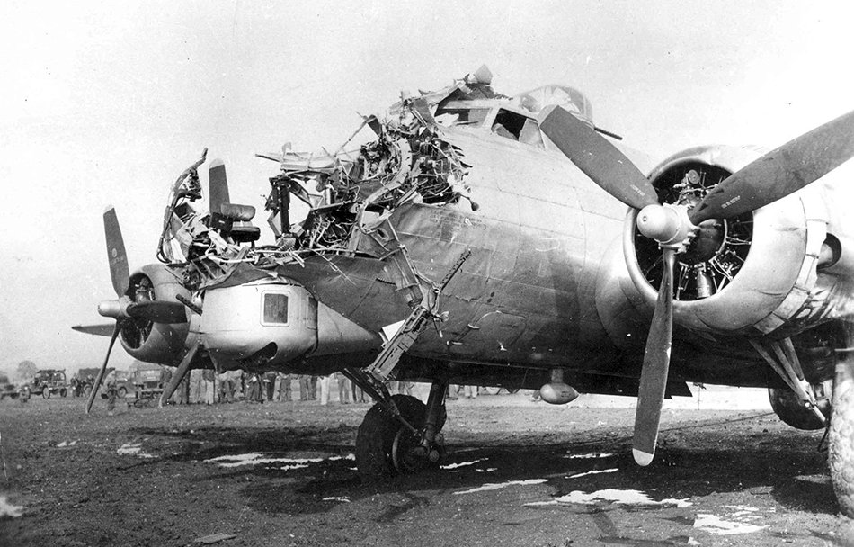 WWIIpix's tweet image. B-17 "Lovely Julie", 398th Bomb Group, hit by flak over Germany, killing toggler Sgt. Abbott and destroying almost all instruments, including oxygen and blowing off almost the entire nose. Nevertheless, the pilot made it back to England. #WW2