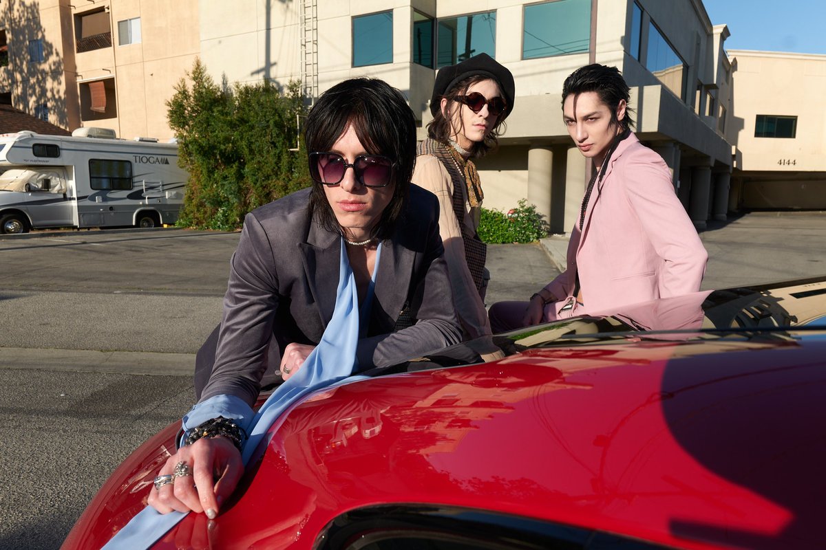 Porsche's tweet photo. #SoundandDriven Episode 3: Rock band @PalayeRoyale &amp; music producer @chrisgreatti take rock &amp; roll on the road with a car test in the all-electric Porsche Taycan. Watch as they experience the track ‘Fever Dream’ cruising the streets of LA: https://t.co/UwryYxrAFK #MarvinTheBrand https://t.co/4CwEELvuvS