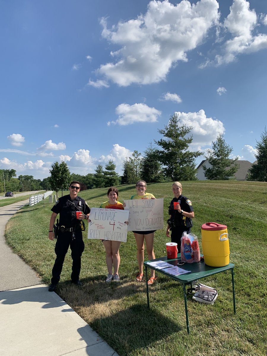 CarmelPD's tweet photo. Officers Fike and Morris stopped by for some refreshing lemonade! These citizens are donating all money raised to @RileyKids ! Located at Clay Center Rd and Jensen Dr - come support a great cause (the lemonade and serenade is just a bonus)! #carmelpd #forthekids #rileyhospital https://t.co/TajPgcIP1W