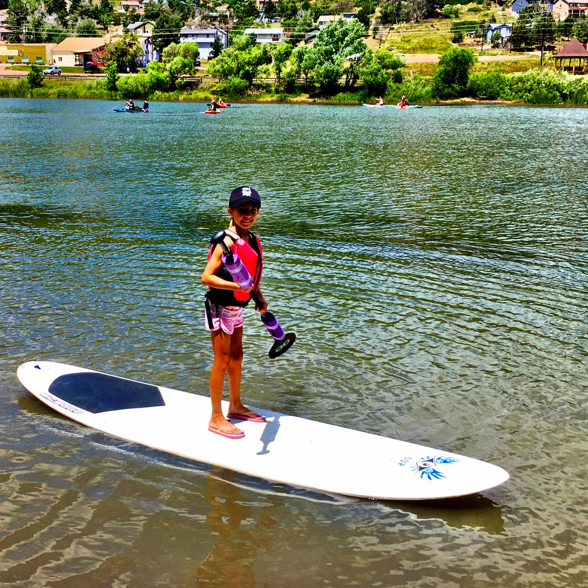 Kaylee (granddaughter) carefully watches the bobber for some fish action ...after a paddling around the lake to see where the fish might be? Summer time at the Lake priceless!