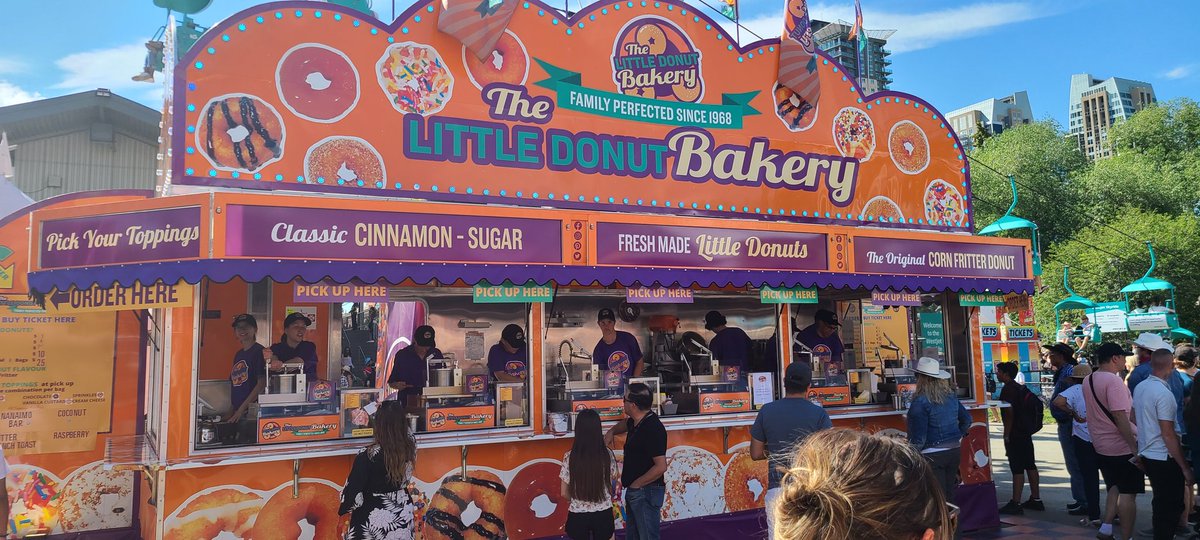 CgyCraig's tweet photo. Great day @calgarystampede with friends - rodeo, midway, and @donut_bakery mini donuts to finish it off. Best donuts there! https://t.co/RxHE0u72Ii