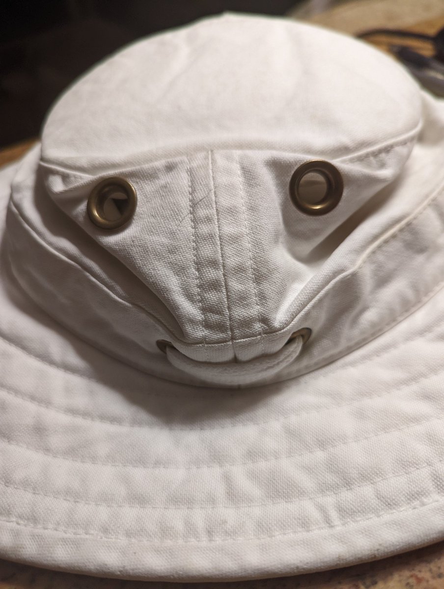 Wonder what my husband's hat is thinking.