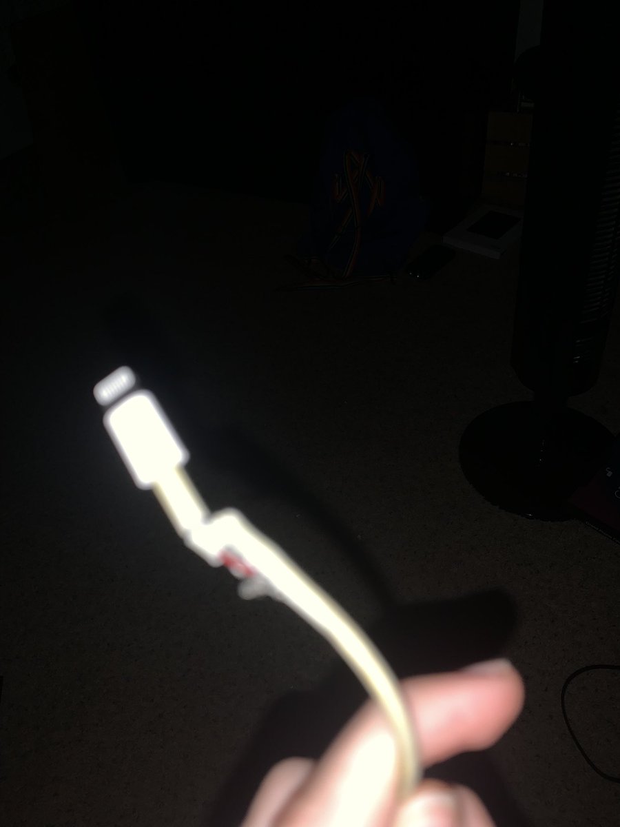 heterosusxual's tweet photo. lost my only other phone charger .welcoming back the fire hazard https://t.co/fmPkIvAf9y