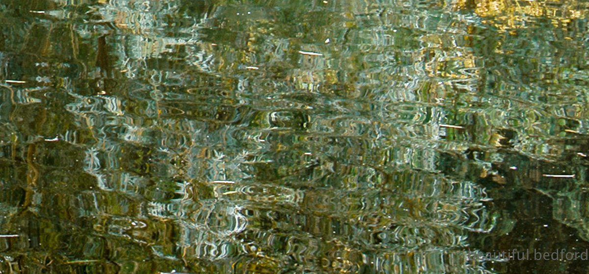 Abstract - based on Autumn reflections in the River Great Ouse