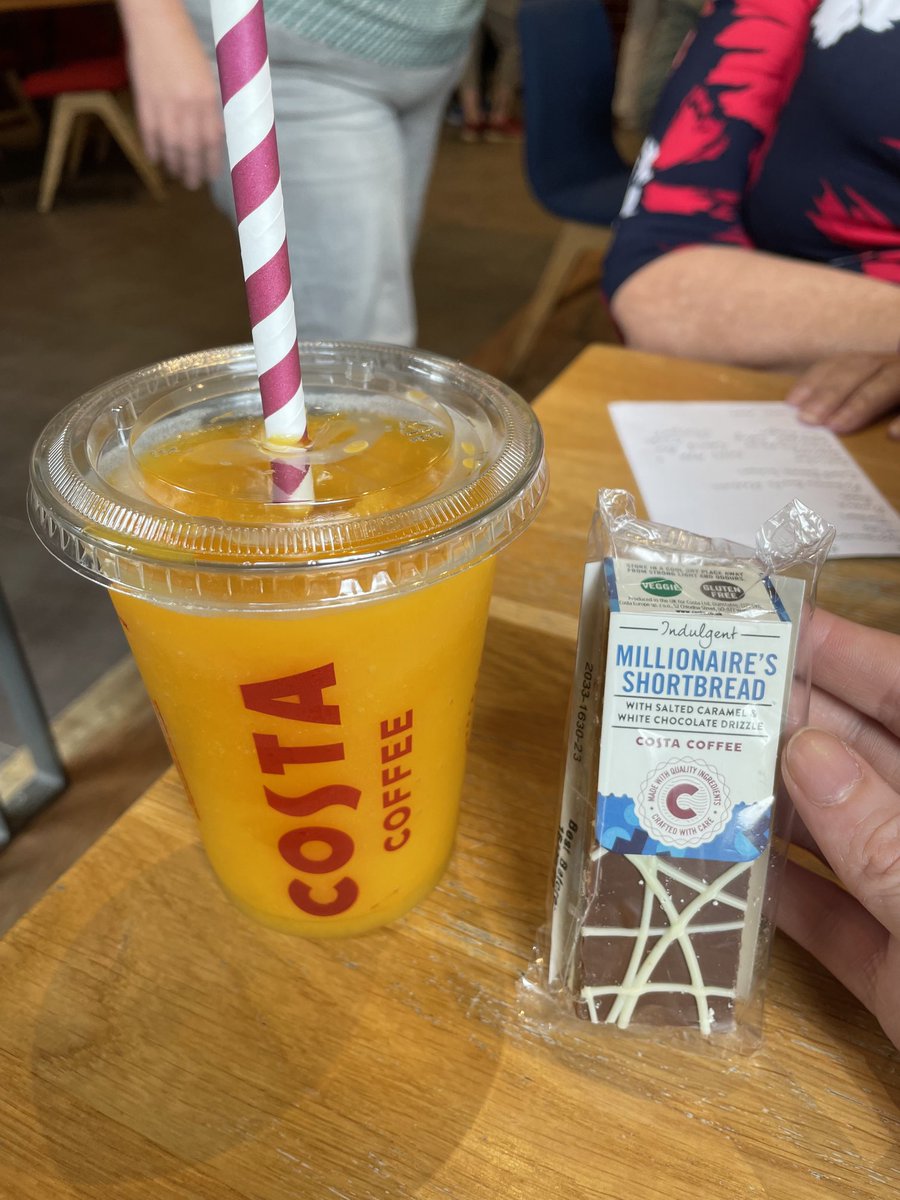 MReview29's tweet photo. ⁦@CostaCoffee⁩ mango and passion fruit cooler #Great along with millionaires shortbread. #burton all the staff were really nice as well as their customer service. people who ordered their drinks go to the end to wait. we had to wait in a group. Only one till as well. https://t.co/Bj20F8eCIE