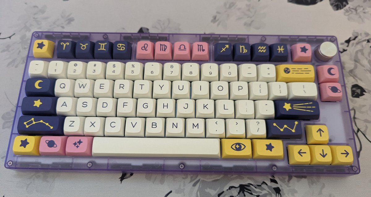 tipsheda's tweet photo. More keyboard posting. This one's a translucent lavender Portico75 with Boba U4T switches and a nice clone keycap set. Kinda in love with this one. First time modding, lubing, and installing stabilizers and they turned out great. https://t.co/xk9WqW05Zw
