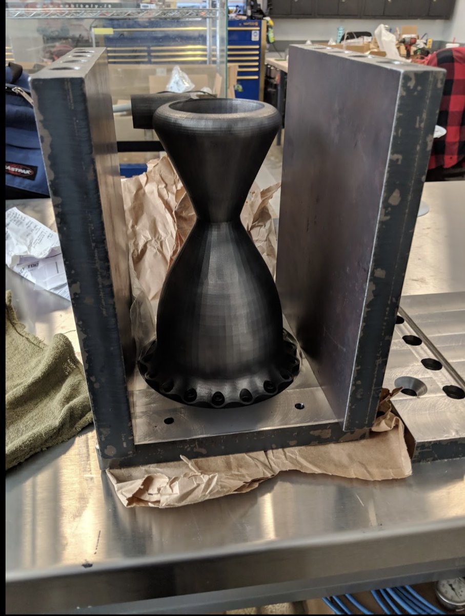 Here is a picture of our V1 3D printed nozzle for our methane/oxygen fueled Valkyrie rocket ready to be machined