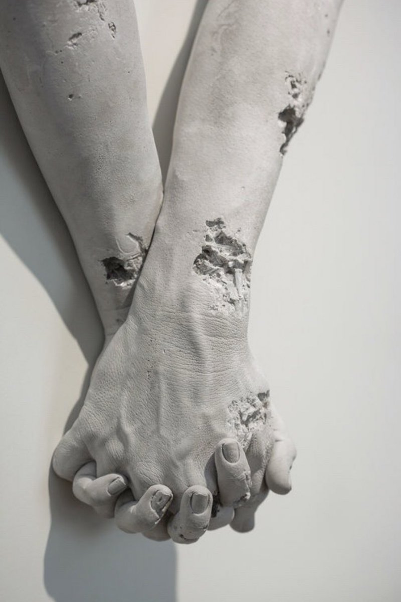 Hand details on statues