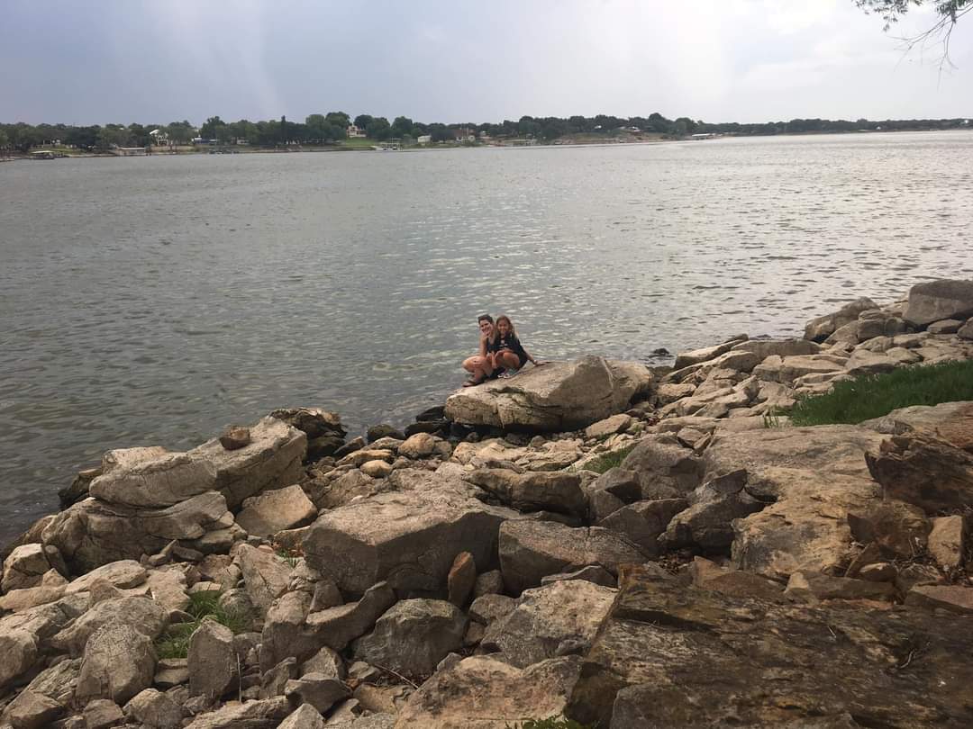 bsandbro1's tweet photo. Here is my "sitting near a body of water" picture! Cali and I were exploring the rocks at Lake Leon. #bethkelearns https://t.co/8Yb6tLx5ls