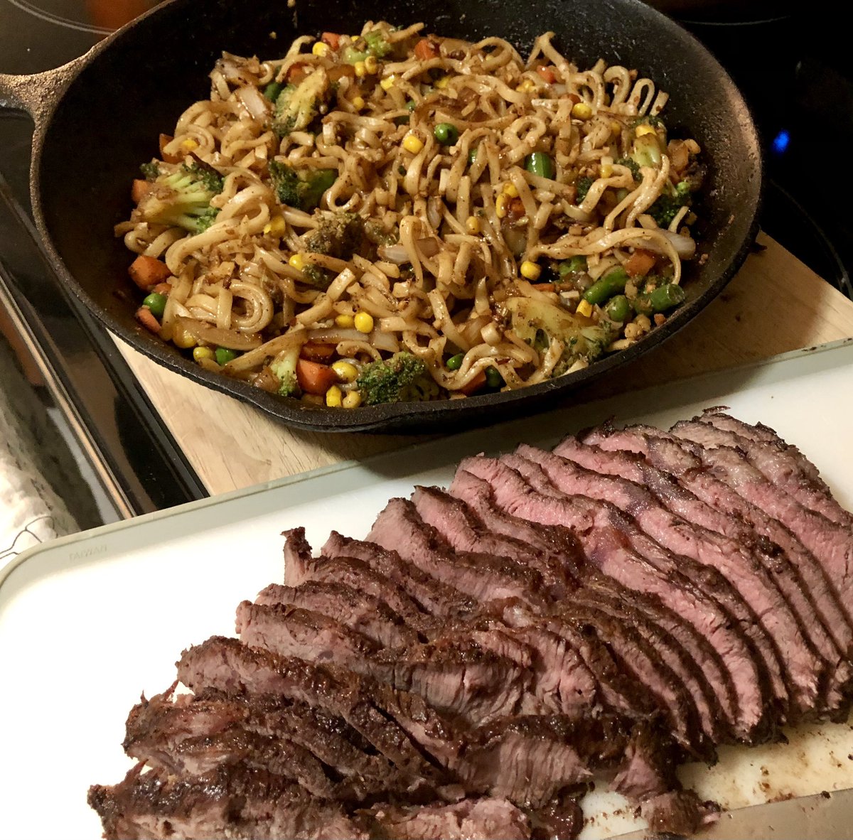 PastorPaulB1's tweet photo. And dinner is on! Flat-iron steak, and stir-fried rice noodles with lots of garlic, ginger, red chilies veggies &amp; soy sauce. Protein &amp; good carbs. #postworkoutfeed #protein4gains #healthyhomecooking https://t.co/LIbVde2X6i