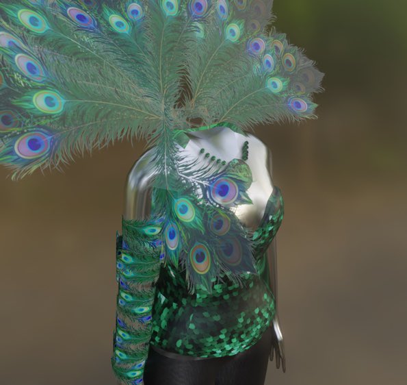 A #digitalfashion wearable that is very @CosmicEndo x Michi is dropping exclusively to @decentraland soon 🦚