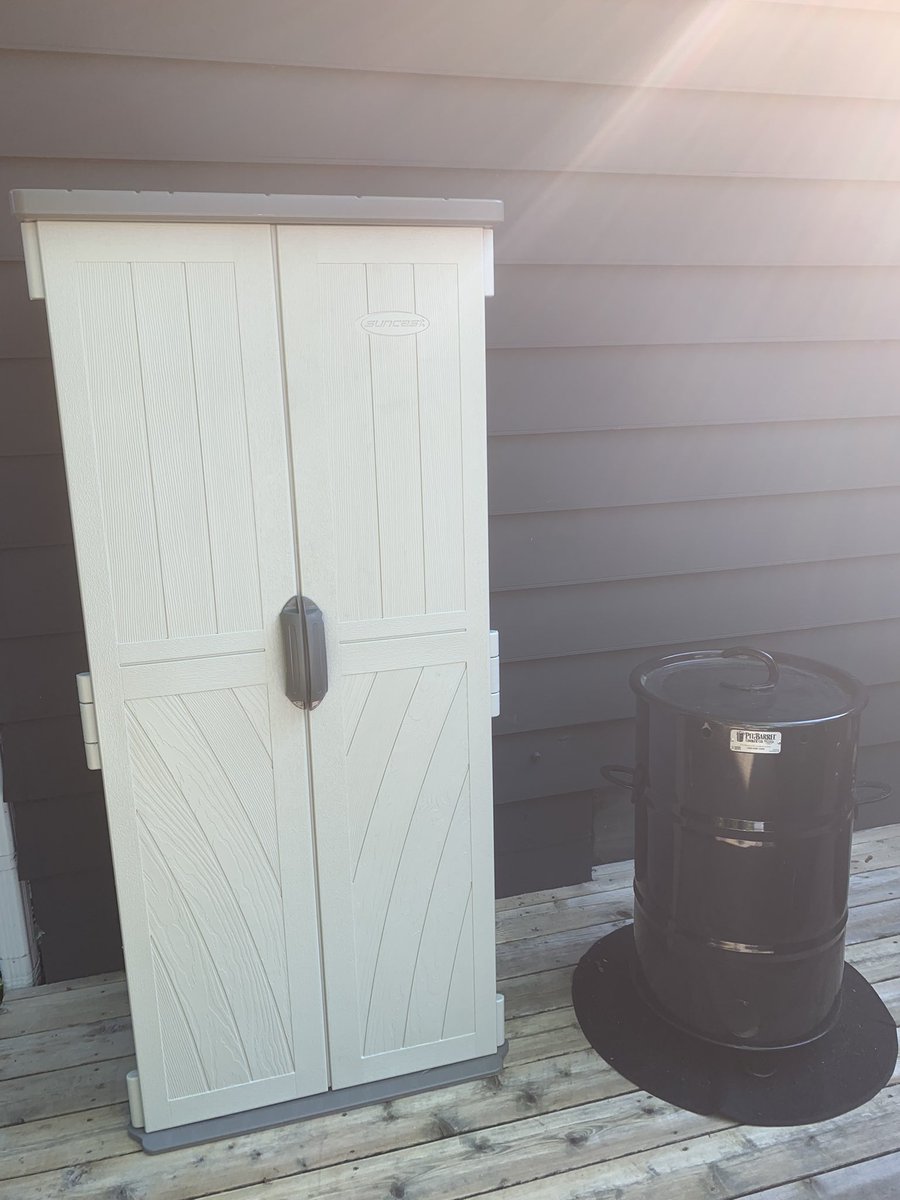 darinchartier's tweet photo. I was feeling a bit unorganized recently with all the accessories for the grill and my @PitBarrelCooker so today I fixed that. Adapted a resin vertical storage cabinet to hold all my stuff outside by the grill and smoker. All my hanging accessories are hung inside and organized!! https://t.co/jTALxgp851