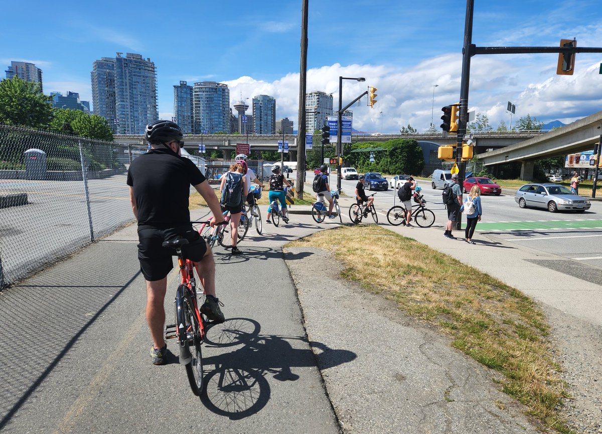 7 bikes ahead of me. If we were all in cars and all stopped a couple metres a part from one another, you'd be looking at an entire block taken up by cars. Cars are square pegs in the round holes of cities. Glad these folks decided not to lug around such huge contraptions.