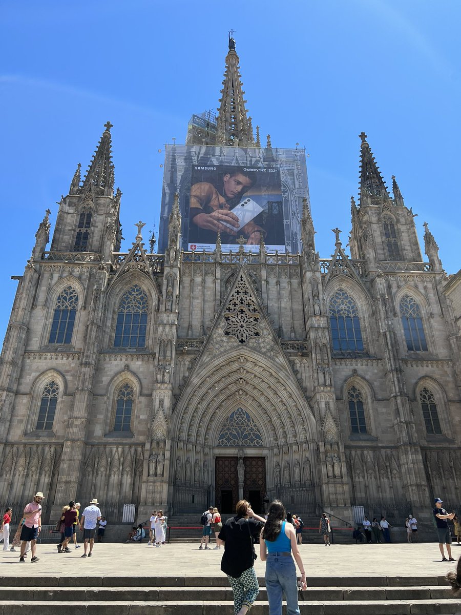 Seeing this giant ad for a Samsung Galaxy S22 on a 13th century cathedral molly said “the 20th century asked ‘is nothing sacred?’ and the 21st said ‘lol no’”